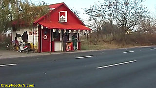 Nylon woman peeing on street