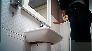 Women pee in public toilet 2259