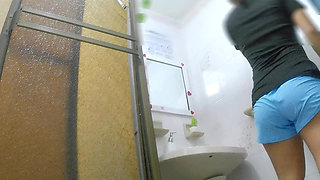 Athletic Girl Pissing in Public Bathroom