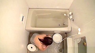 Alluring Asian milf gets fucked in the toilet on cam