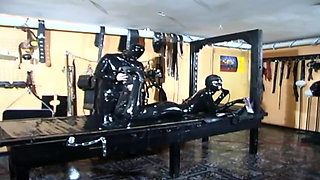 Bdsm with masked girl in latex