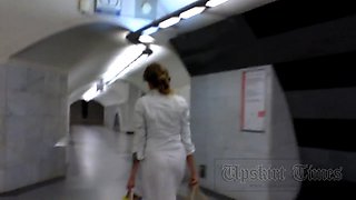 Upskirt without panties. Blonde in long white skirt.