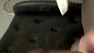 Adult starts to insert piercing into hole and pre