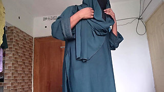 Shy Muslim Girl Taking off Burqa Slowly