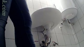 White amateur stranger lady in jeans caught on cam in the toilet