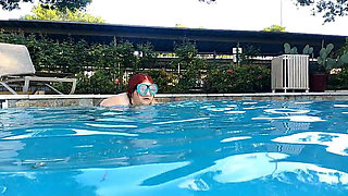 Couple Underwater Diving and Swimming