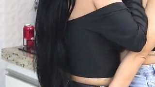 Two Girls Rubbing Each Other in Jeans in Intense Kisses