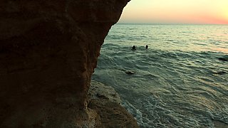 Beautiful Girl Thanking Her Lifeguard On The Beach