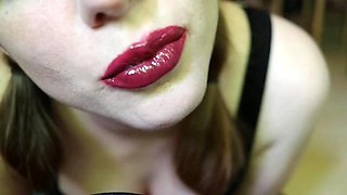 Lip gloss application, kisses and nylon touches