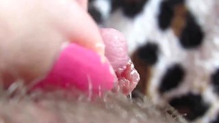 Aroused amateur girl gets horny and caresses her oversized clit