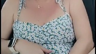 Married woman showing off in the car while the cuckold drives