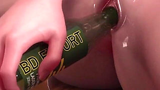 Bottle in the Pussy of a Young Bitch