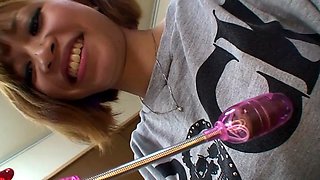 Cute Japanese girls in purple lingerie gets her pussy teased with toys