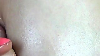 Busty slut rubs my dick with her oily tits