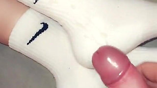 Footjob in Long Socks and Cums on Socks