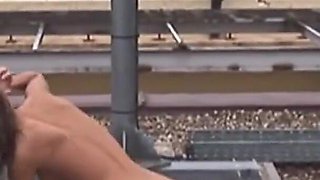 Curious and sexy blonde gets fucked on the roof by two workers