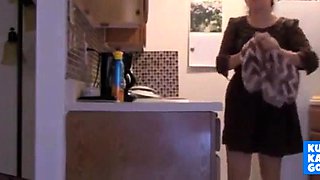 Hot stepmother Teases And Masturbates In Kitchen