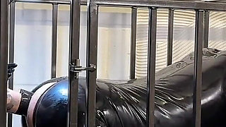 Anal Stretching a Caged Gimp