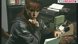 Lesbo lovers kiss each other on top of the table