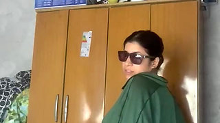 Selene enjoy in front of the camera and shows off her new glasses.