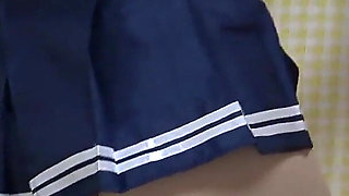 Apartment Exclusively for Japanese Girls, a Room Where Skinny Girl Mini Skirt, No Bra Apron Uniform, Thong Is Sitting on Chair
