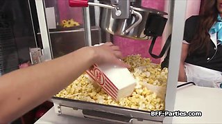 Serving pop corn and twat before movie