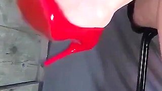 Pale Legs Red Heels and Hard Toe Tapping.