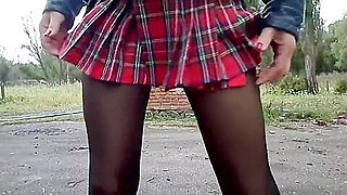 Nylon tights, high heel and school skirt