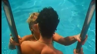 Gorgeous and sassy blonde babe sucks dick by the pool