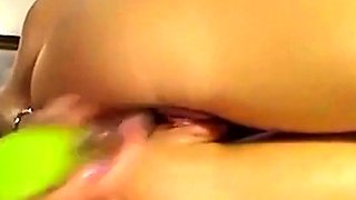 Big-Titted Brunette Plays with Dildo on Webcam