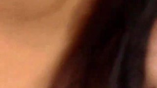 He finds his woman masturbating on the bed with a sexy toy and videotapes her with the camera.