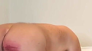 Young domme canes her slave