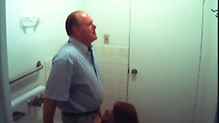 Bathroom slut sucks dick in restroom