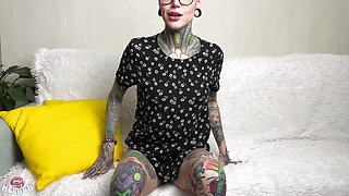 Tattooed student fingering her pussy to shaking orgasm