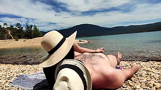 Naughty couple fucked on a public nude beach