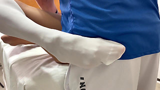 An injured tennis player gets hands on help from the nurse