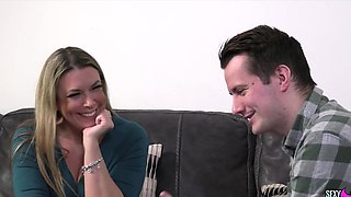 Maisie Lewis, the busty british milf, seduces with her charm.