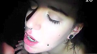 Pierced brunette mouth fucks cocks on gloryhole