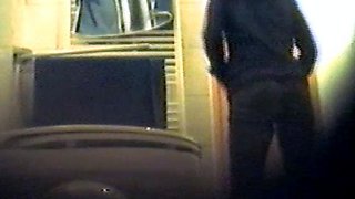Girl using the toilet and filmed by voyeur 1