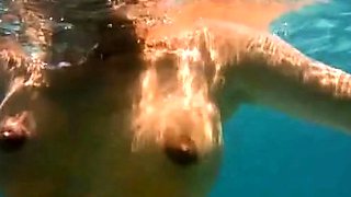 Serbian Cougar Gets Oiled Up