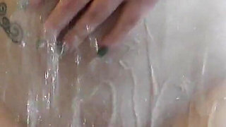 Naked Babe Washes Pussy in the Shower.