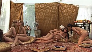 Hot milf Emily Doll and Katalin Kiraly in a group sex scene.