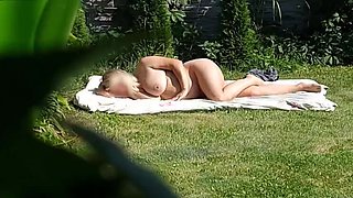 Sexy Blonde Stepmom sunbathing Naked in the Yard