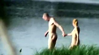 Naughty young lovers having passionate sex in the outdoors