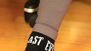 Under Desk Foot Play - Pink Clogs & Worn Socks