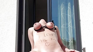 Milf Julie squirts on flat roof