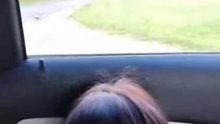 Two lesbian milfs double dildo fucking and pussy licking in car