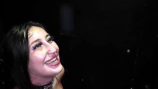 Busty brunette Anna Chambers gets pounded through the gloryhole