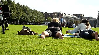 Street voyeur films a blonde and a brunette in the park