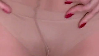 Hot GILF April White Gives Her Pantyhosed Pussy the Attention It Needs